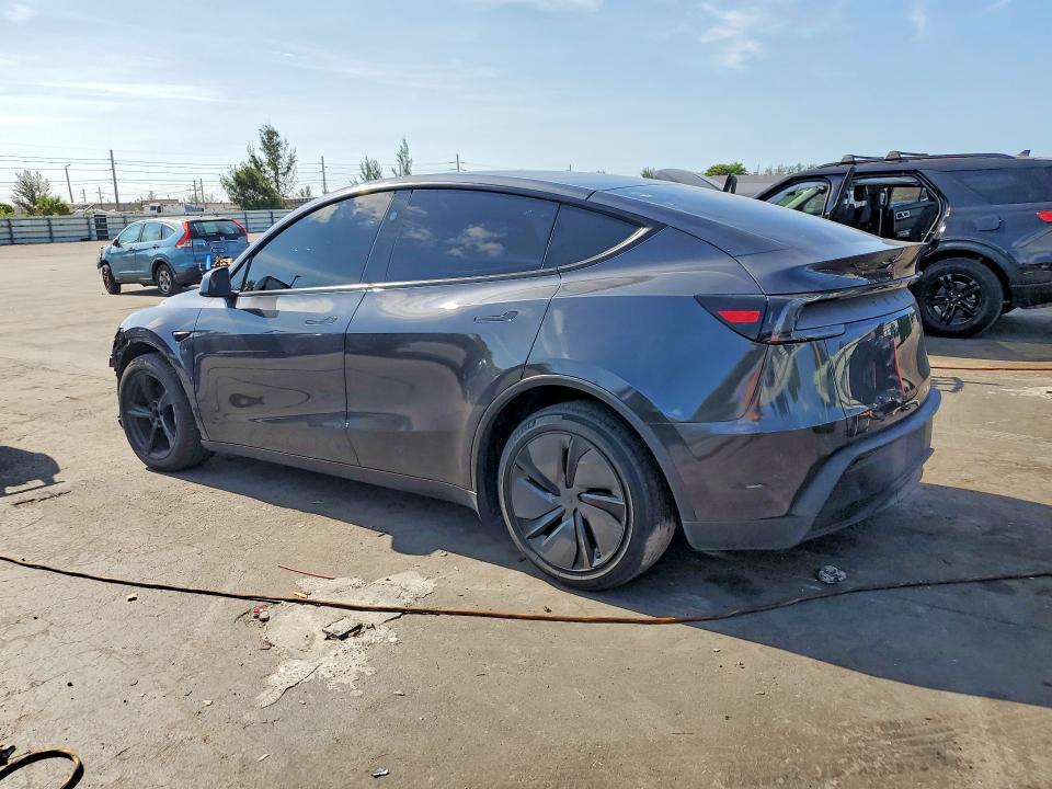 2026 Tesla Model y VIN 7SAYGDEE1TA388288 COPART salvage auction — FRONT END, Fl - Cert Of Title Slvg Rebuildable, sold $19,400 on 2026-07-13 (photo 2)