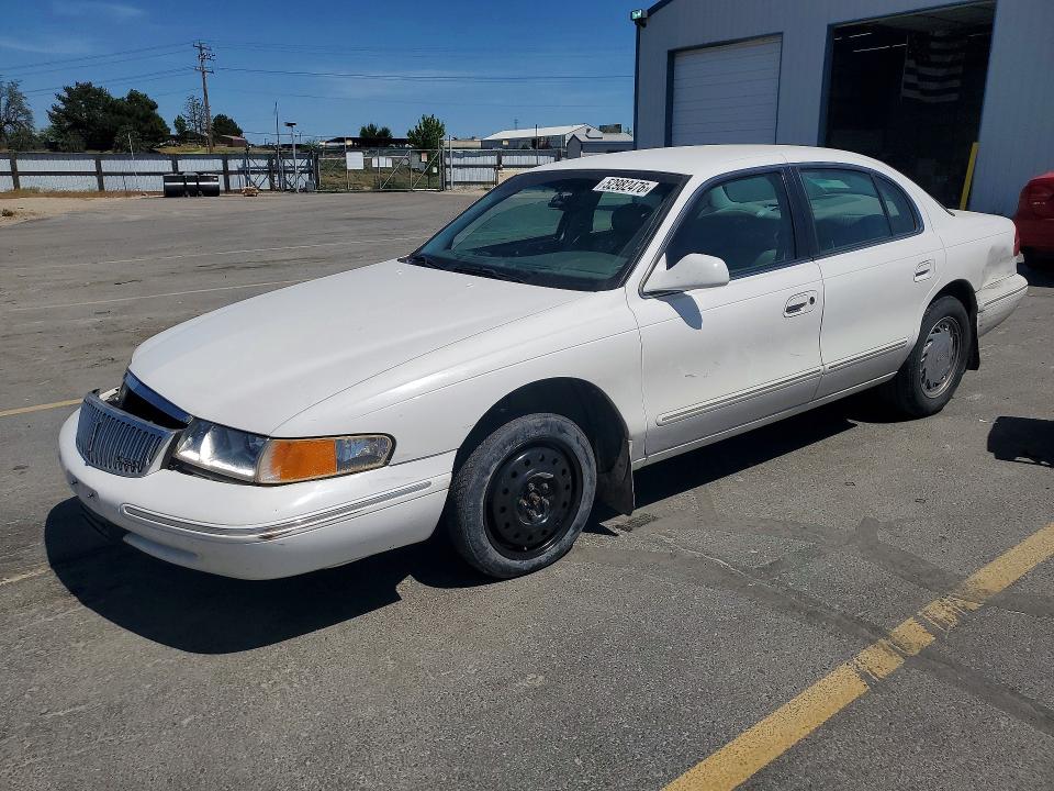 1995 Lincoln Continental VIN 1LNLM97VXSY686264 COPART salvage auction — SIDE, ID - SALVAGE CERTIFICATE OF TITLE, sold $225 on 2026-07-30 (photo 1)