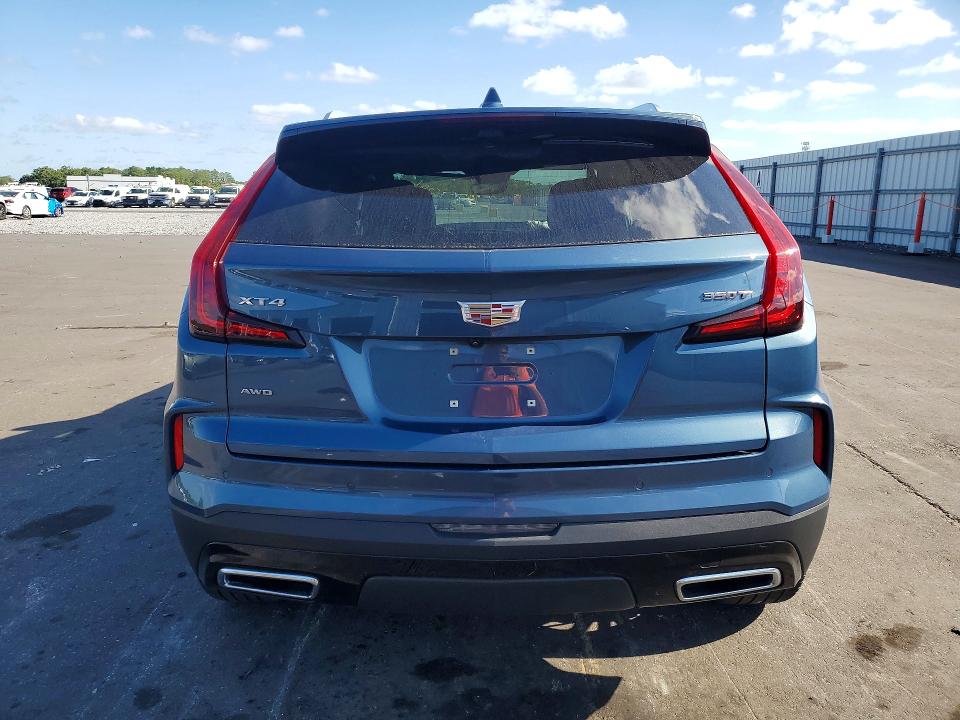 2024 Cadillac Xt4 VIN 1GYFZDR40RF159716 COPART salvage auction — FRONT END, Fl - Certificate Of Destruction, sold $8,200 on 2026-07-20 (photo 6)