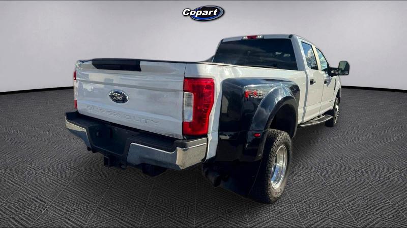 2017 Ford F-350 super duty VIN 1FT8W3DT7HED16940 COPART salvage auction — NORMAL WEAR, Tx - Certificate Of Title (P), sold $13,900 on 2026-07-02 (photo 4)