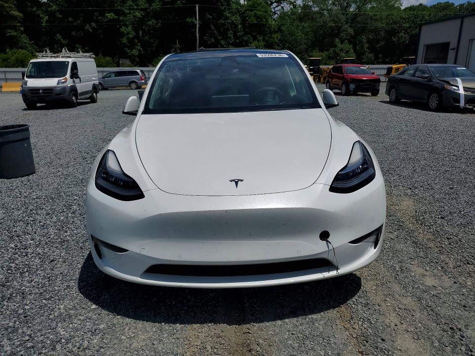 2022 Tesla Model y VIN 7SAYGDEE6NF358144 COPART salvage auction — SIDE, Nc - Salvage Certificate Of Title, sold $13,000 on 2026-07-16 (photo 5)