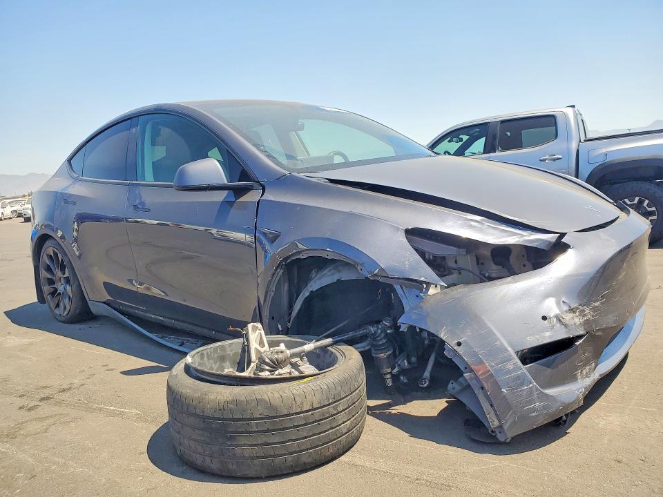 2022 Tesla Model y VIN 7SAYGAEEXNF400989 COPART salvage auction — FRONT END, Ca - Salvage Certificate, sold $9,600 on 2026-07-13 (photo 4)