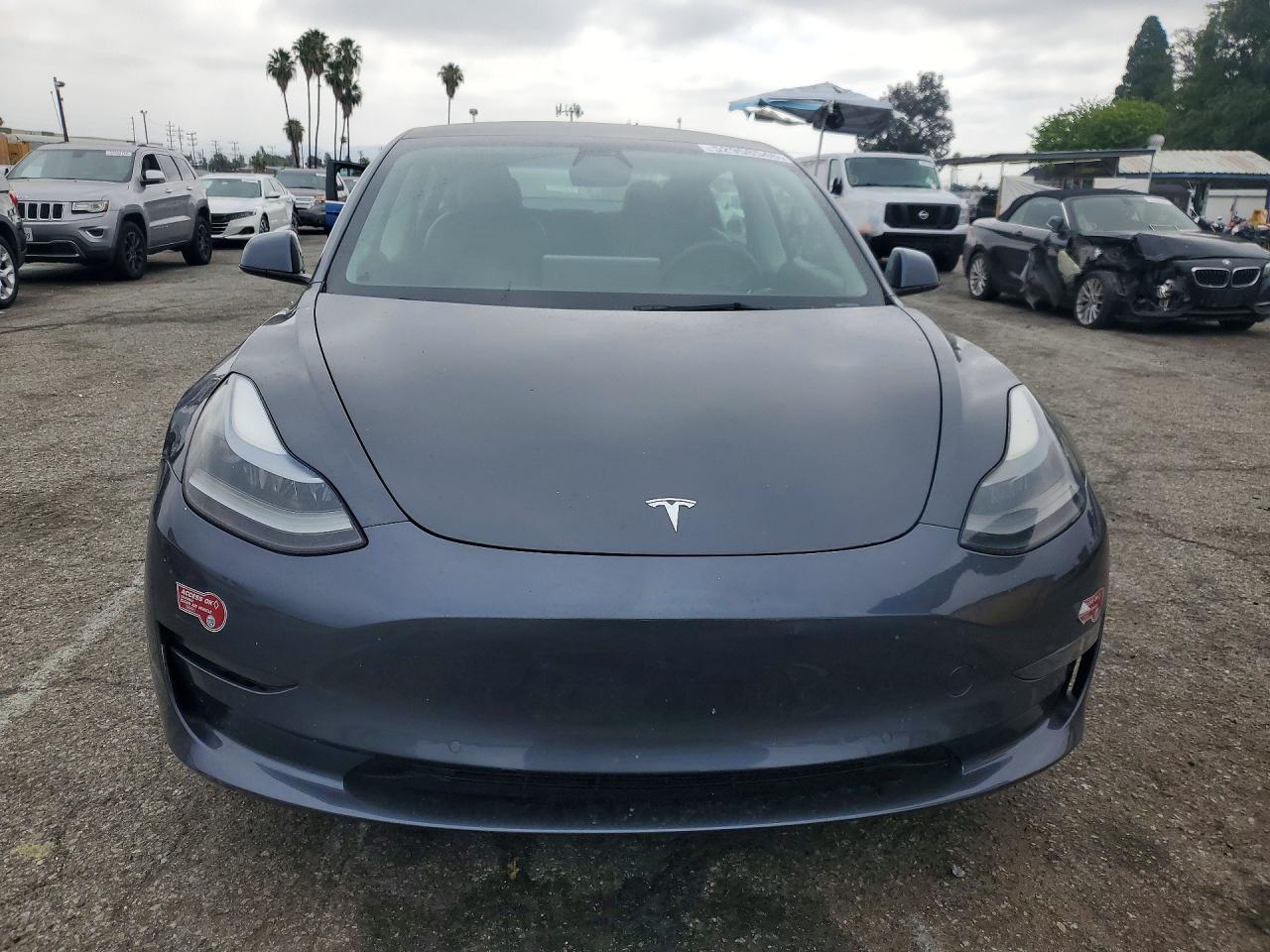 2021 Tesla Model 3 VIN 5YJ3E1EA5MF100589 COPART salvage auction — Rear End, CA - SALVAGE CERTIFICATE, sold $8,500 on 2026-07-10 (photo 5)
