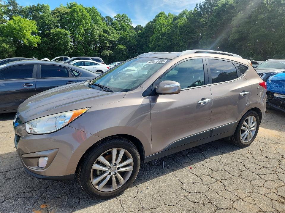 2012 Hyundai Tucson VIN KM8JU3AC7CU486561 COPART salvage auction — REAR END, GA - CERT OF TITLE-SALVAGE, sold $2,100 on 2026-07-17 (photo 1)
