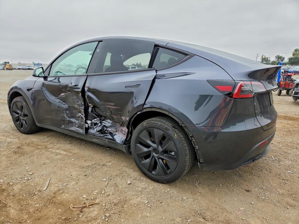 2025 Tesla Model y VIN 7SAYGDED0SF253523 COPART salvage auction — SIDE, Ca - Salvage Certificate, sold $13,600 on 2026-07-24 (photo 2)