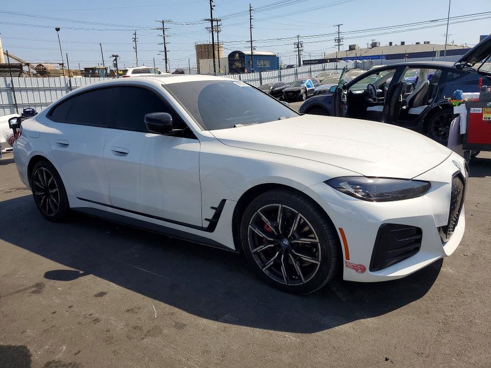 2024 BMW VIN WBY43AW06RFS63074 COPART salvage auction — REAR END, Ca - Salvage Certificate, sold $17,400 on 2026-07-29 (photo 4)