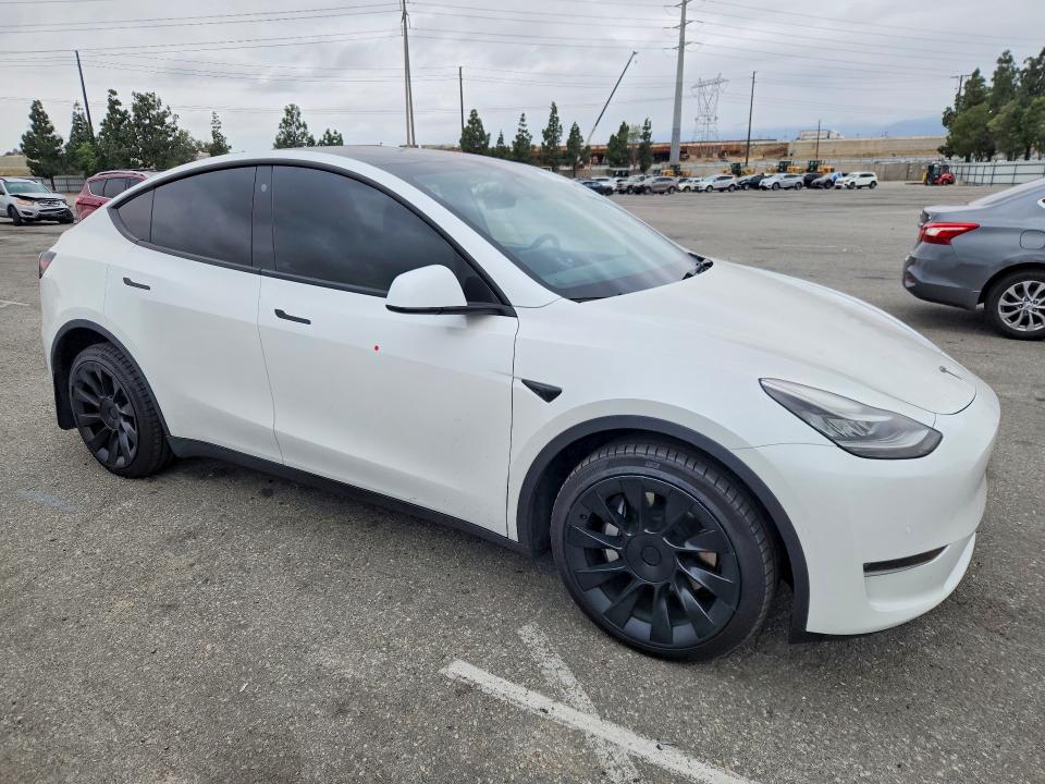 2021 Tesla Model y VIN 5YJYGDEE7MF299987 COPART salvage auction — SIDE, CA - SALVAGE CERTIFICATE, sold $150 on 2026-07-21 (photo 4)