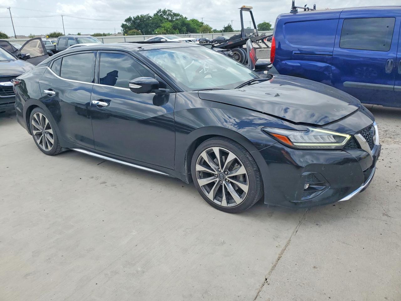 2023 Nissan Maxima VIN 1N4AA6FV9PC506013 COPART salvage auction — Hail, TX - SALVAGE VEHICLE TITLE, sold $6,100 on 2026-06-25 (photo 4)