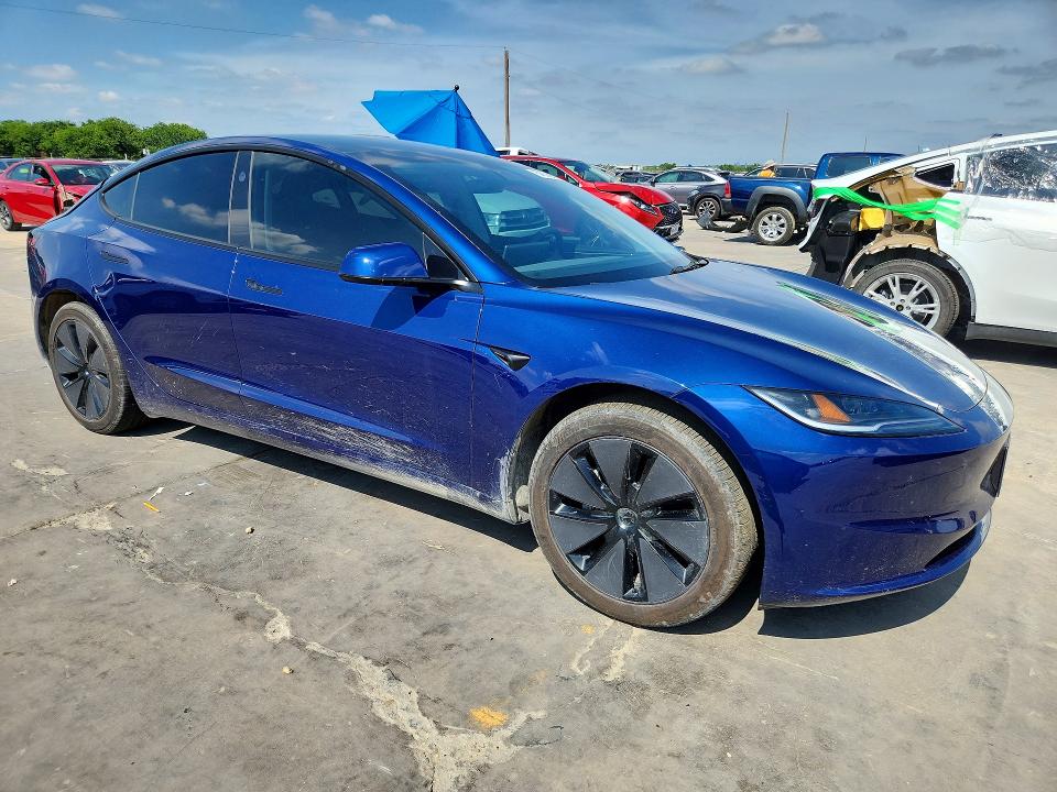 2025 Tesla Model 3 VIN 5YJ3E1EB4SF015393 COPART salvage auction — SIDE, Tx - Salvage Vehicle Title, sold $12,100 on 2026-07-13 (photo 4)