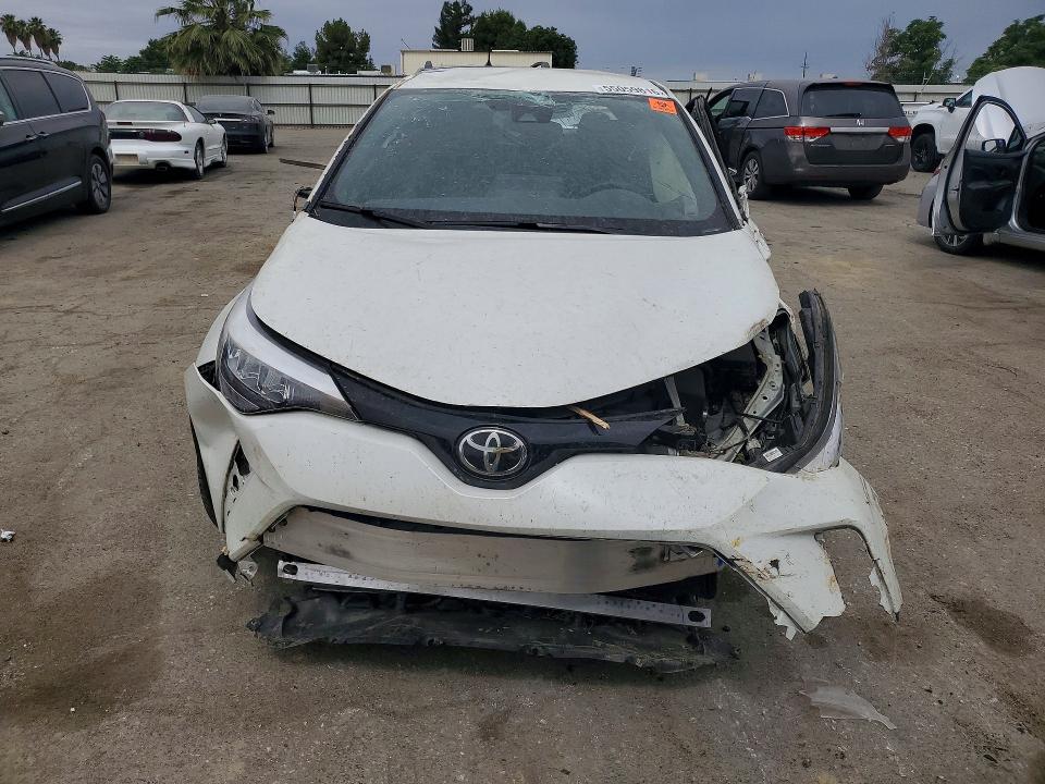 2021 Toyota C-hr VIN NMTKHMBX9MR133389 COPART salvage auction — ROLLOVER, Ca - Salvage Certificate, sold $1,450 on 2026-07-17 (photo 5)