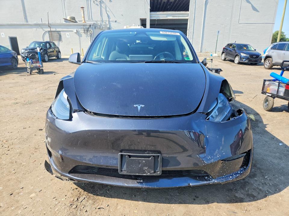 2025 Tesla Model y VIN 7SAYGDEF7SA350930 COPART salvage auction — SIDE, Va - Cert Of Title - Salvage, sold $11,800 on 2026-07-04 (photo 5)