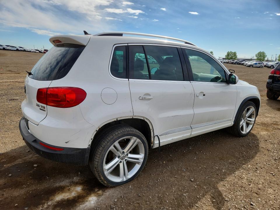 2014 Volkswagen Tiguan VIN WVGJV3AX7EW548502 COPART salvage auction — SIDE, Ab - Bos - Salvage, sold $200 on 2026-07-28 (photo 3)