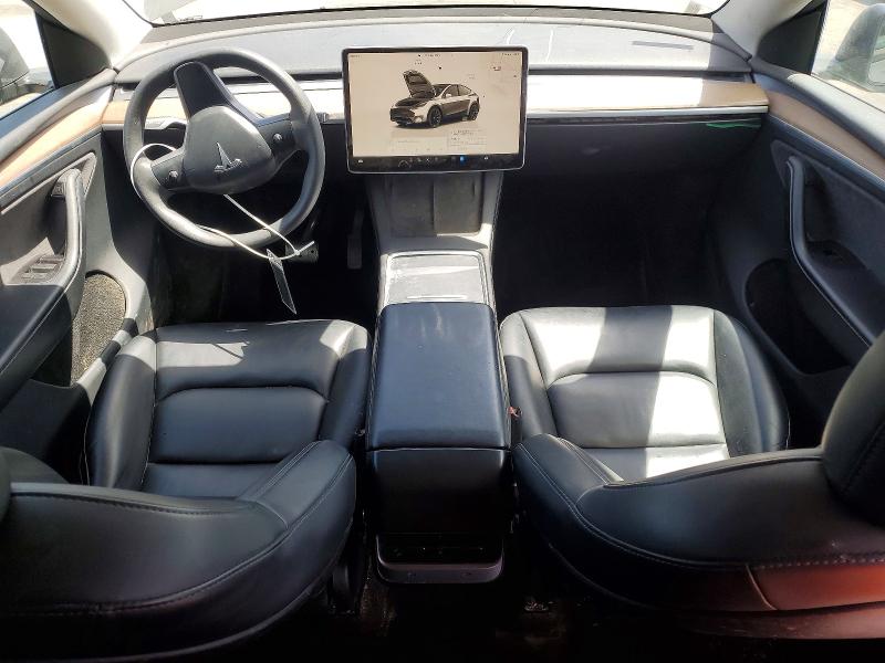 2023 Tesla Model y VIN 7SAYGDEE8PA113412 COPART salvage auction — MINOR DENT/SCRATCHES, Ca - Salvage Certificate, sold $14,100 on 2026-07-15 (photo 8)