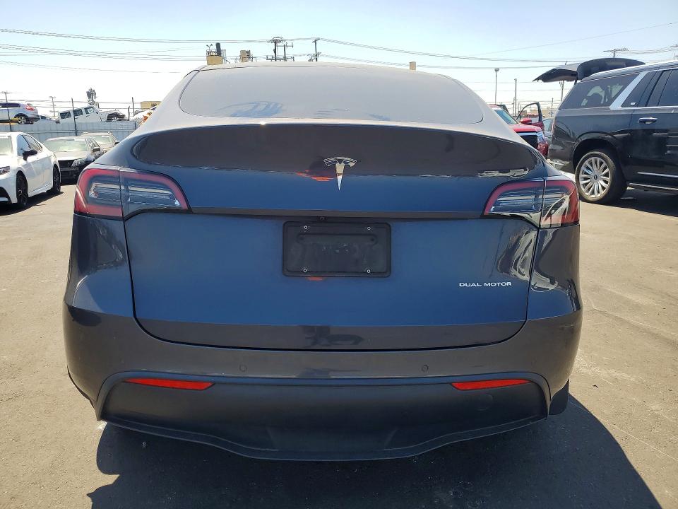 2022 Tesla Model y VIN 7SAYGAEEXNF400989 COPART salvage auction — FRONT END, Ca - Salvage Certificate, sold $9,600 on 2026-07-13 (photo 6)