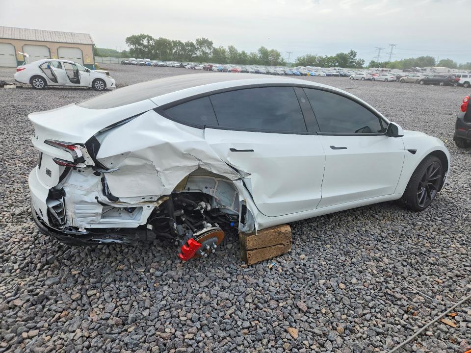 2025 Tesla Model 3 VIN 5YJ3E1ET6SF057637 COPART salvage auction — REAR END, Il - Salvage Certificate, sold $13,600 on 2026-07-20 (photo 3)