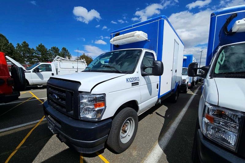 2023 Ford Econoline VIN 1FDWE3FK9PDD08532 — COPART salvage auction photo