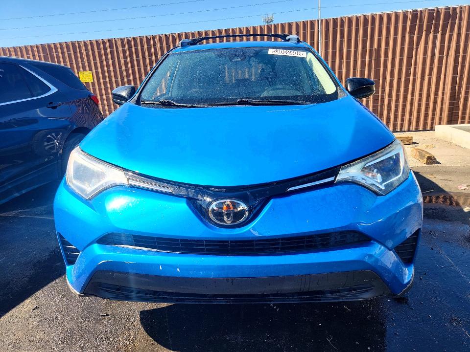 2017 Toyota Rav 4 VIN JTMZFREV5HD094539 COPART salvage auction — SIDE, Nv - Salvage Title, sold $1,750 on 2026-07-07 (photo 5)