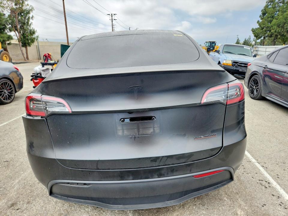 2024 Tesla Model y VIN 7SAYGDEF0RA326320 COPART salvage auction — FRONT END, Ca - Salvage Certificate, sold $7,400 on 2026-07-07 (photo 6)