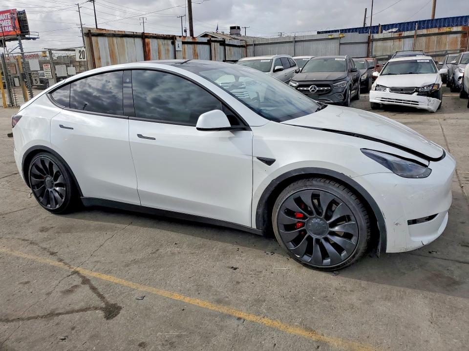 2023 Tesla Model y VIN 7SAYGDEF5PF738880 COPART salvage auction — FRONT END, Az - Dis/Dlr/Exp Only Salvage Title, sold $12,600 on 2026-07-27 (photo 4)