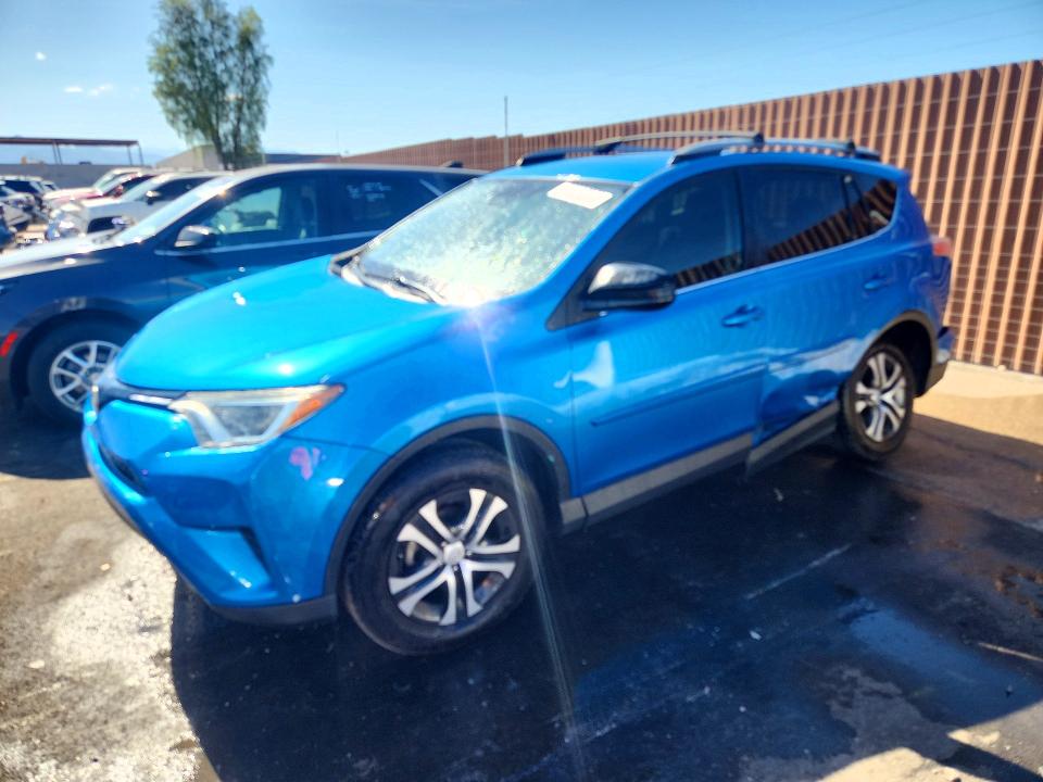 2017 Toyota Rav 4 VIN JTMZFREV5HD094539 COPART salvage auction — SIDE, Nv - Salvage Title, sold $1,750 on 2026-07-07 (photo 1)