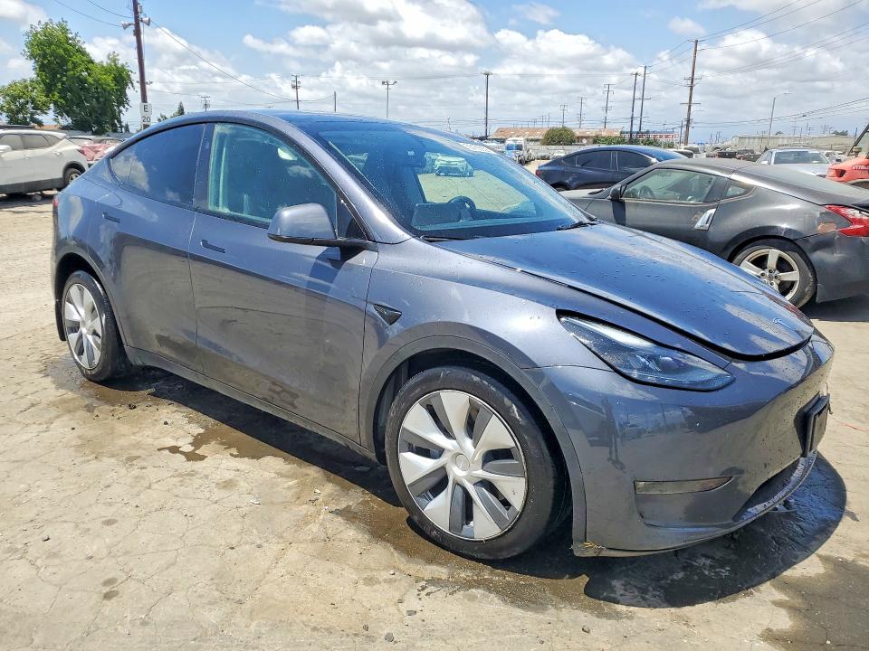 2023 Tesla Model y VIN 7SAYGDEE9PF915423 COPART salvage auction — FRONT END, Ca - Salvage Certificate, sold $10,400 on 2026-07-27 (photo 4)