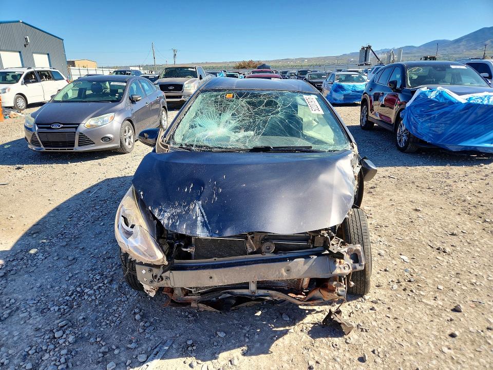 2015 Toyota Prius c VIN JTDKDTB37F1111606 COPART salvage auction — FRONT END, Ut - Salvage Certificate, sold $150 on 2026-07-07 (photo 5)