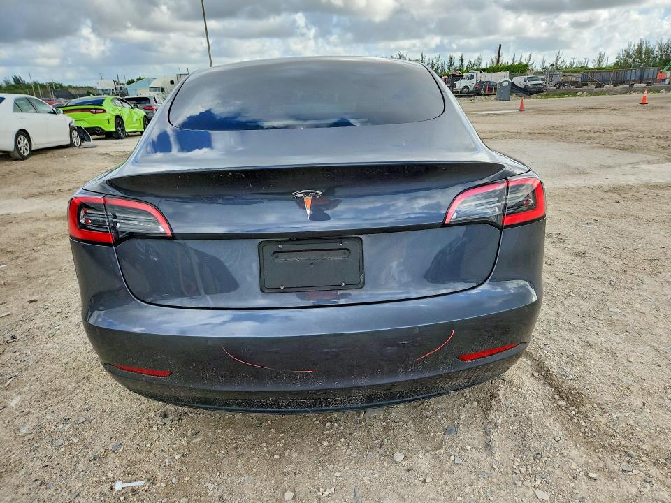 2021 Tesla Model 3 VIN 5YJ3E1EA1MF087839 COPART salvage auction — FRONT END, Fl - Cert Of Title Slvg Rebuildable, sold $8,700 on 2026-07-09 (photo 6)