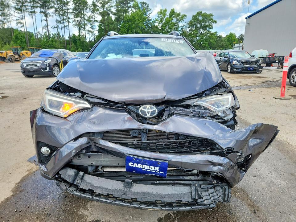 2018 Toyota Rav 4 VIN JTMJFREV6JJ208018 COPART salvage auction — REAR END, Sc - Non-Reb & Rem Salvage Title, sold $2,700 on 2026-07-27 (photo 5)