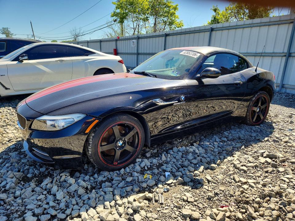 2011 BMW Z4 VIN WBALM5C59BE495940 COPART salvage auction — MINOR DENT/SCRATCHES, Fl - Cert Of Ttl-Rebuilt&Slvg Rbld (P), sold $2,700 on 2026-07-08 (photo 1)