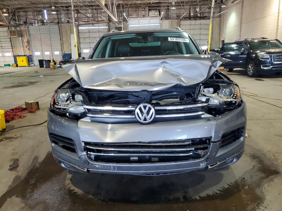 2014 Volkswagen VIN WVGEP9BP4ED012132 COPART salvage auction — FRONT END, Mi - Certificate Of Title, sold $2,900 on 2026-07-07 (photo 5)