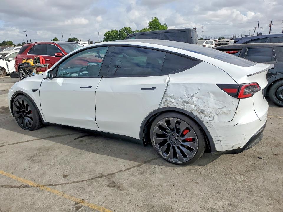 2023 Tesla Model y VIN 7SAYGDEF5PF738880 COPART salvage auction — FRONT END, Az - Dis/Dlr/Exp Only Salvage Title, sold $12,600 on 2026-07-27 (photo 2)