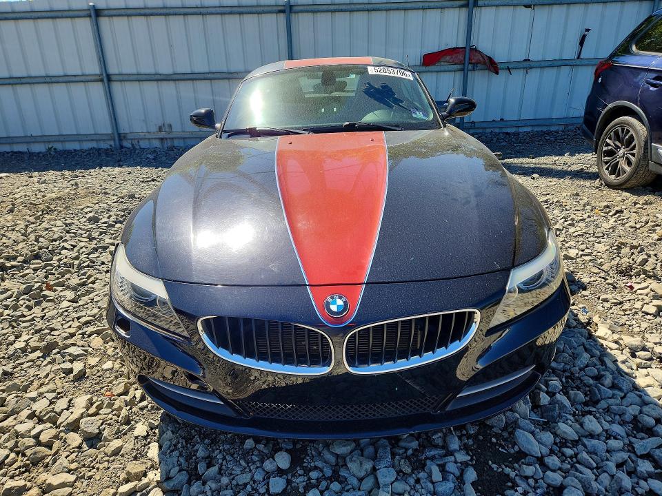 2011 BMW Z4 VIN WBALM5C59BE495940 COPART salvage auction — MINOR DENT/SCRATCHES, Fl - Cert Of Ttl-Rebuilt&Slvg Rbld (P), sold $2,700 on 2026-07-08 (photo 5)