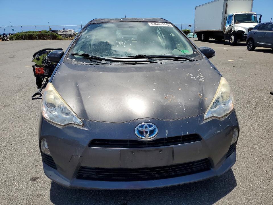 2014 Toyota Prius c VIN JTDKDTB3XE1570143 COPART salvage auction — MINOR DENT/SCRATCHES, HI - CERTIFICATE OF TITLE, sold $90 on 2026-07-27 (photo 5)