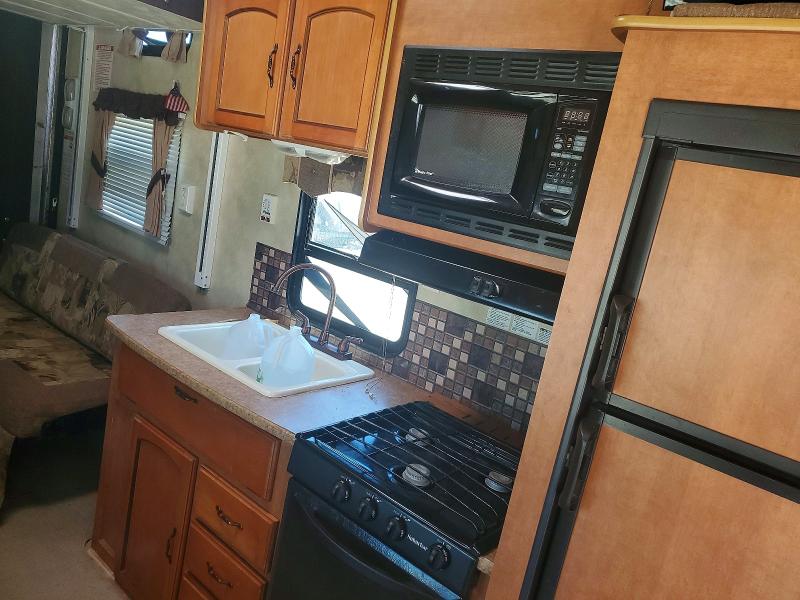 2012 Foresriver VIN 4X4TPTC25CP034903 COPART salvage auction — REAR END, AL - CERT OF TITLE-SALVAGE TITLE, sold $1,600 on 2026-07-06 (photo 8)