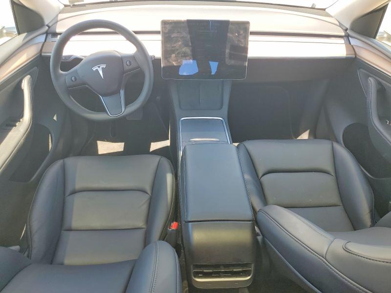 2024 Tesla Model y VIN 7SAYGAEE6RF167456 COPART salvage auction — REAR END, VA - CERT OF TITLE - SALVAGE, sold $9,900 on 2026-07-08 (photo 8)