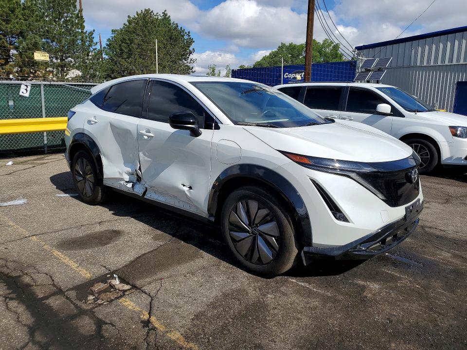 2024 Nissan Ariya VIN JN1BF0BA1RM432070 COPART salvage auction — SIDE, Co - Salvage Title, sold $325 on 2026-07-28 (photo 4)