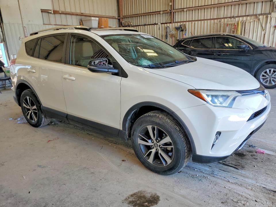2016 Toyota Rav 4 VIN JTMWFREV8GJ097986 COPART salvage auction — HAIL, TX - CERTIFICATE OF TITLE, sold $9,900 on 2026-07-25 (photo 4)