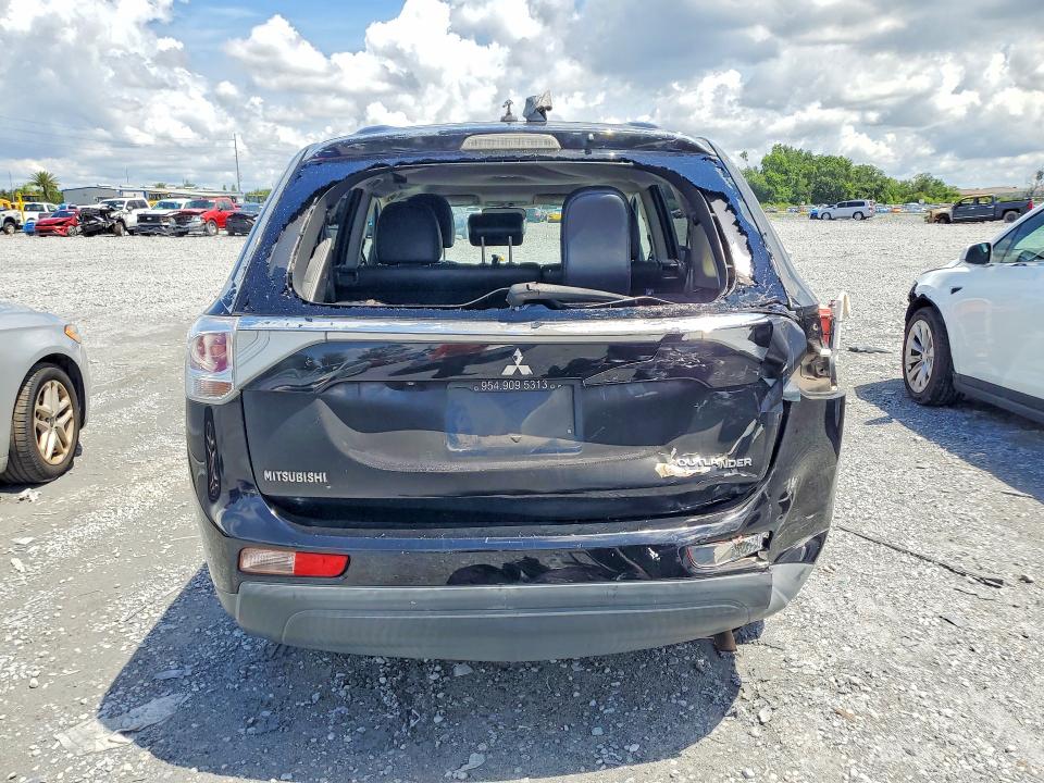 2014 Mitsubishi VIN JA4AD3A3XEZ013306 COPART salvage auction — REAR END, Fl - Cert Of Title Slvg Rebuildable, sold $999 on 2026-07-10 (photo 6)