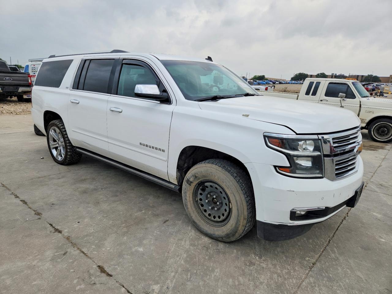 2015 Chevrolet Suburban VIN 1GNSKKKC0FR243809 COPART salvage auction — Hail, TX - CERTIFICATE OF TITLE, sold $3,450 on 2026-07-02 (photo 4)
