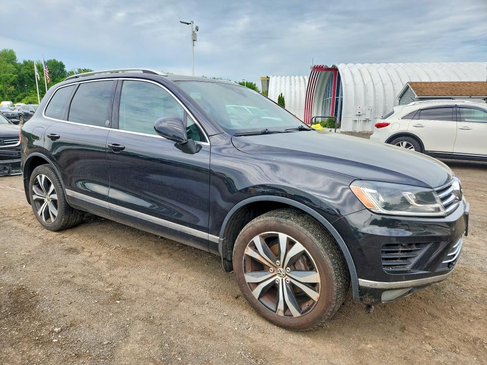 2017 Volkswagen Touareg VIN WVGRF7BP9HD000586 COPART salvage auction — MINOR DENT/SCRATCHES, Mi - Certificate Of Title, sold $3,850 on 2026-07-09 (photo 4)