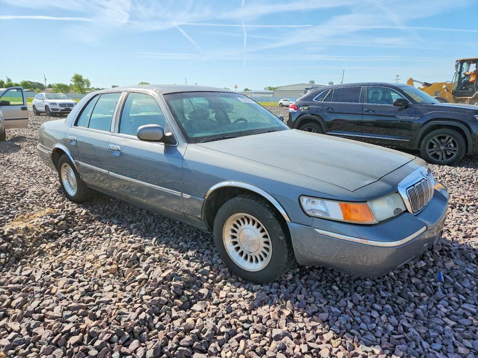 1998 Mercury Grand marquis VIN 2MEFM75WXWX665629 COPART salvage auction — HAIL, Mo - Salvage Certificate Of Title, sold $650 on 2026-07-27 (photo 4)