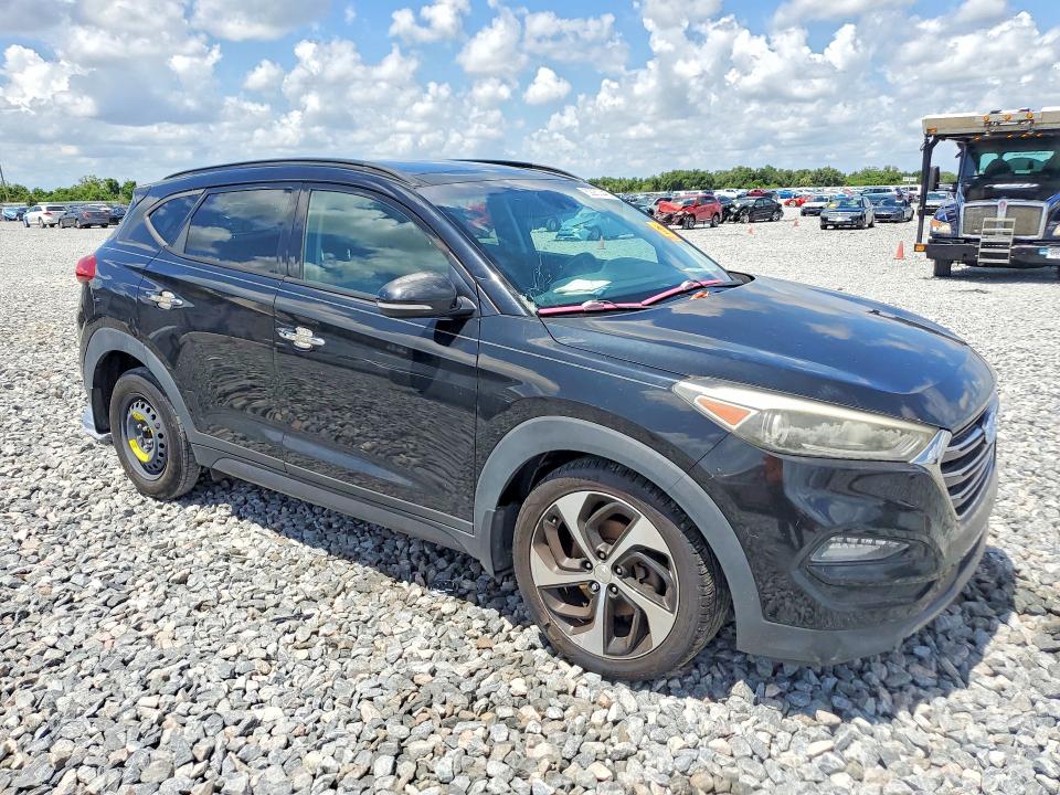 2016 Hyundai Tucson VIN KM8J33A22GU085600 COPART salvage auction — HAIL, FL - CERT OF TITLE SLVG REBUILDABLE, sold $2,700 on 2026-07-24 (photo 4)