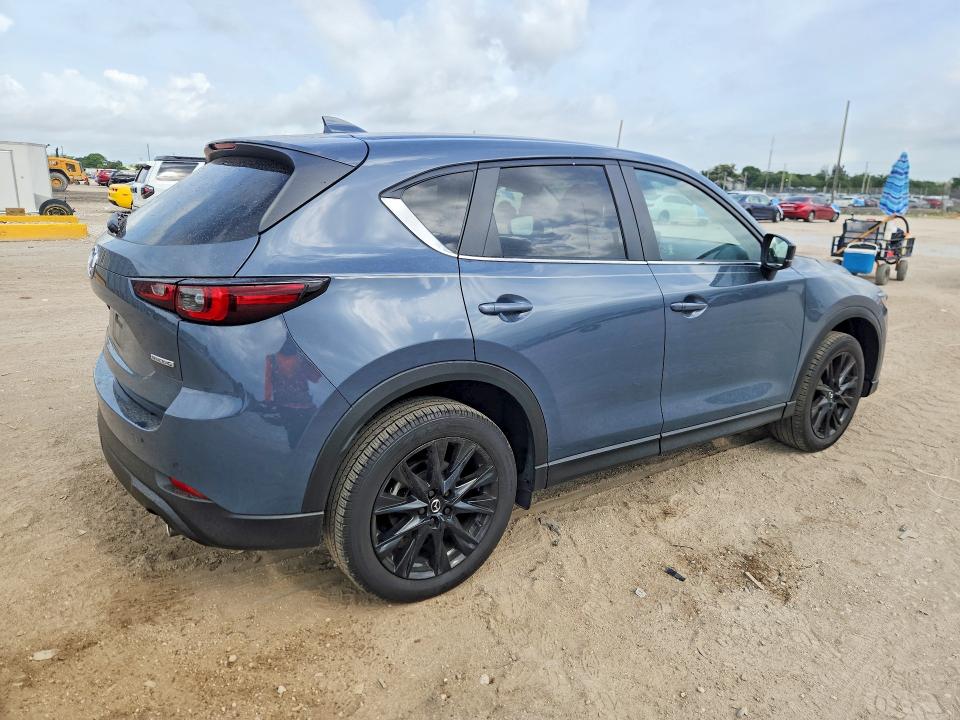 2025 Mazda Cx-5 VIN JM3KFBCM8S0611597 COPART salvage auction — SIDE, Fl - Cert Of Title Slvg Rebuildable, sold $12,200 on 2026-07-16 (photo 3)
