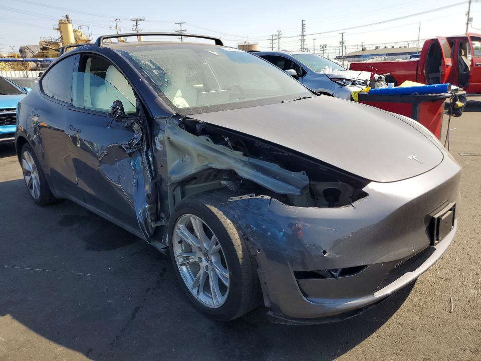 2022 Tesla Model y VIN 7SAYGAEE1NF558671 COPART salvage auction — FRONT END, CA, sold $12,200 on 2026-10-08 (photo 4)