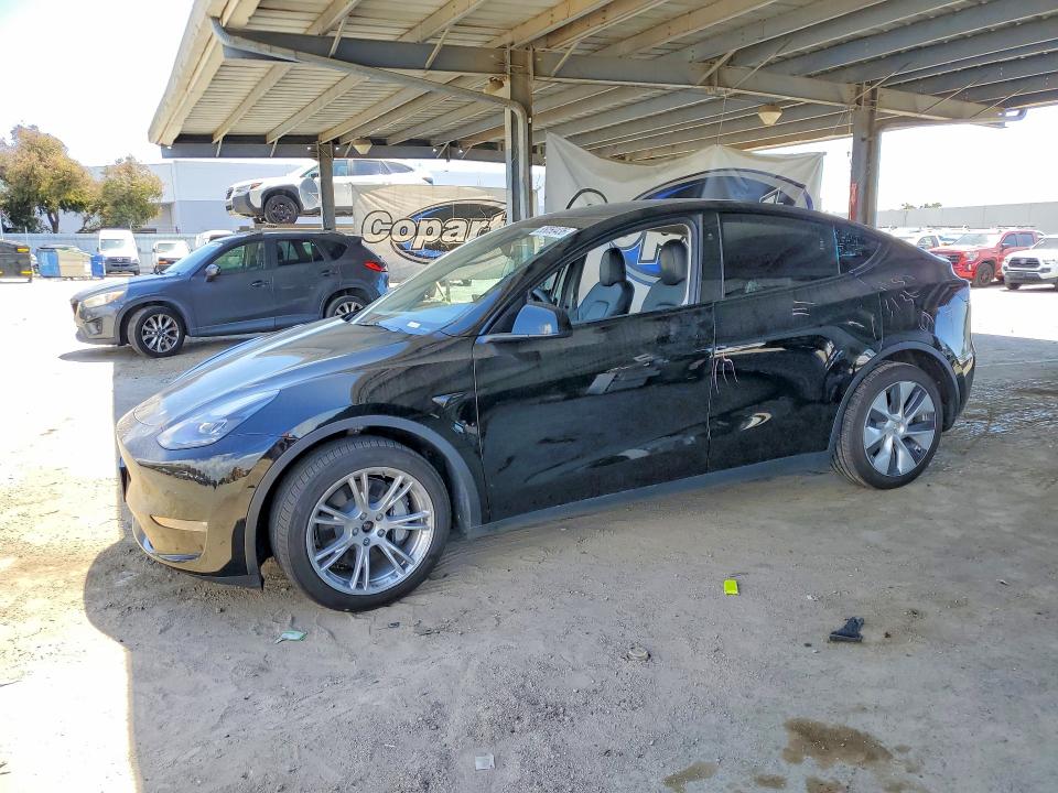 2023 Tesla Model y VIN 7SAYGDEE2PF892342 COPART salvage auction — SIDE, CA - SALVAGE CERTIFICATE, sold $7,800 on 2026-07-21 (photo 1)