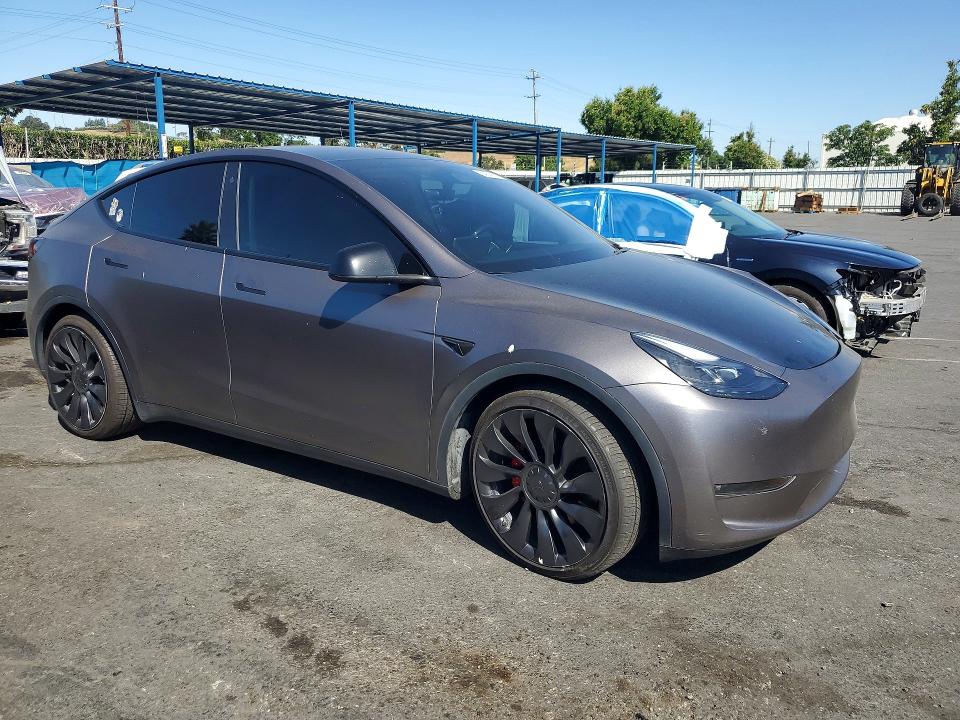 2022 Tesla Model y VIN 7SAYGDEF4NF517865 COPART salvage auction — FRONT END, CA - SALVAGE CERTIFICATE, sold $12,000 on 2026-07-14 (photo 4)