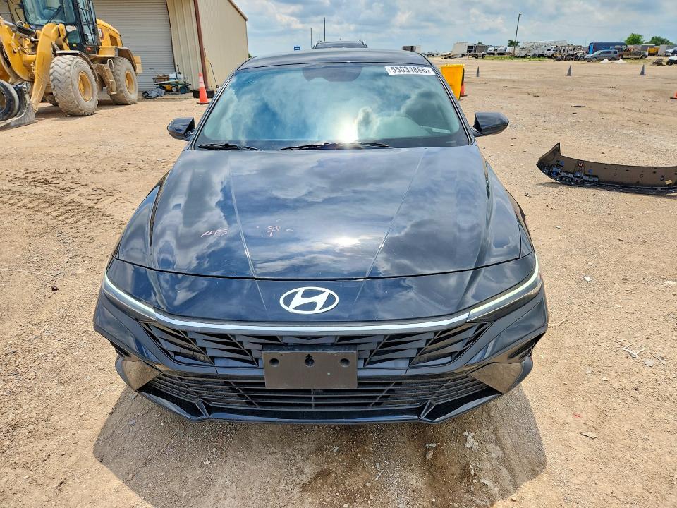 2025 Hyundai Elantra VIN KMHLM4DG1SU015663 COPART salvage auction — REAR END, TX - SALVAGE VEHICLE TITLE (P), sold $5,000 on 2026-07-22 (photo 5)