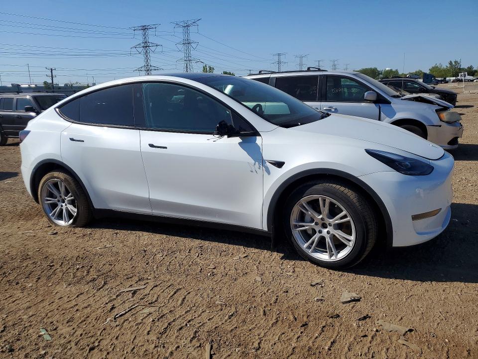 2023 Tesla VIN 7SAYGDEE1PF792748 COPART salvage auction — REAR END, Il - Salvage Certificate, sold $12,600 on 2026-07-30 (photo 4)