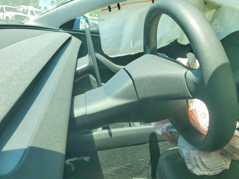 2025 Tesla VIN 5YJ3E1EB8SF879928 COPART salvage auction — FRONT END, Ca - Salvage Certificate, sold $12,000 on 2026-07-31 (photo 8)