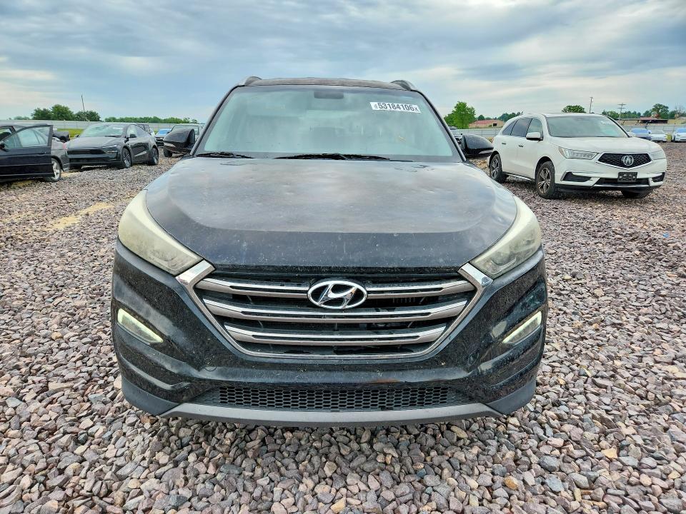 2016 Hyundai Tucson VIN KM8J33A28GU201382 COPART salvage auction — HAIL, Mo - Certificate Of Title, sold $4,550 on 2026-07-15 (photo 5)